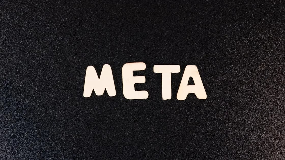 a close up of a black surface with white letters
